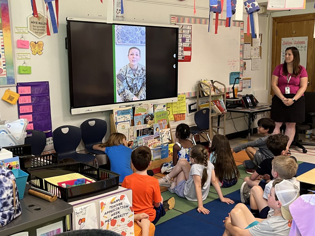 Mrs. Merritt's second grade class was awarded a plaque from Navy Reservist Jessica Serafin for their work in sending letters to military members overseas.