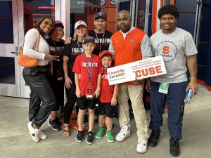 Charlie Prior and his family meet SU Football Coach Fran Brown and his family.