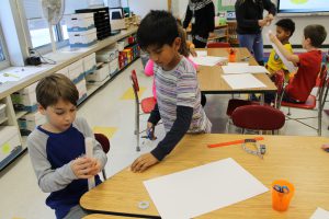 Third graders at Fayetteville Elementary build structures out of paper for an engineering challenge.