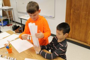 Third graders at Fayetteville Elementary build structures out of paper for an engineering challenge.