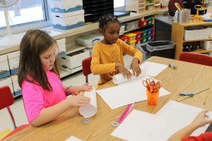 Third graders at Fayetteville Elementary build structures out of paper for an engineering challenge.