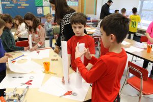 Third graders at Fayetteville Elementary build structures out of paper for an engineering challenge.