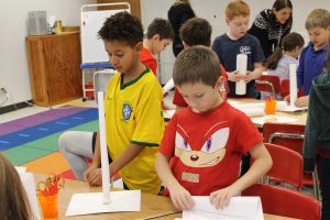 Third graders at Fayetteville Elementary build structures out of paper for an engineering challenge.