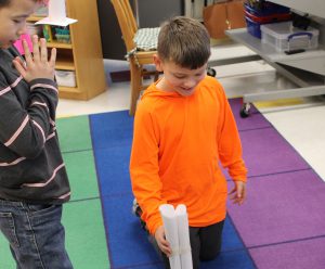 Third graders at Fayetteville Elementary build structures out of paper for an engineering challenge.