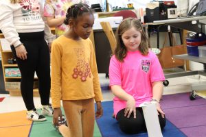 Third graders at Fayetteville Elementary build structures out of paper for an engineering challenge.