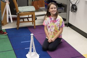 Third graders at Fayetteville Elementary build structures out of paper for an engineering challenge.